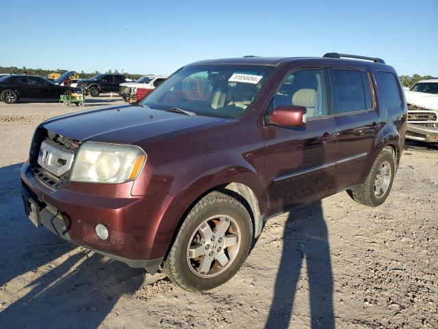 HONDA PILOT TOUR 2010 with VIN 5FNYF4H83AB030633 - Photo from auction