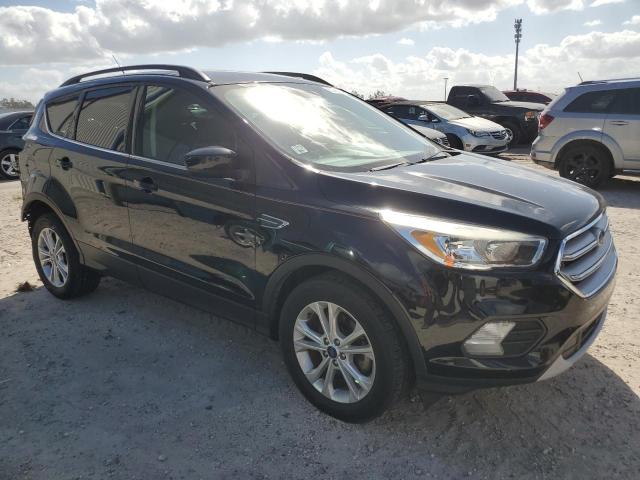 Photo 4 from auction – 2018 FORD ESCAPE SE with VIN 1FMCU0GD6JUD34341
