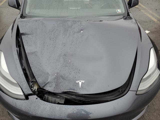 Photo 11 from auction – 2022 TESLA MODEL 3 with VIN 5YJ3E1EB7NF107442