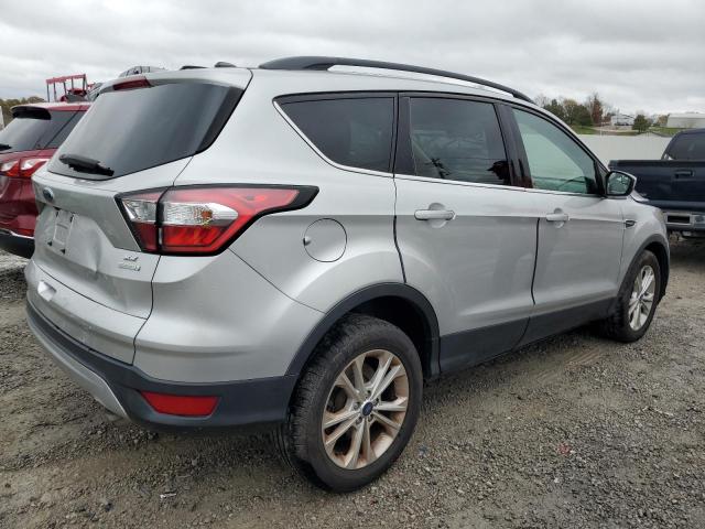 Photo 3 from auction – 2018 FORD ESCAPE SE with VIN 1FMCU0GD9JUB58806