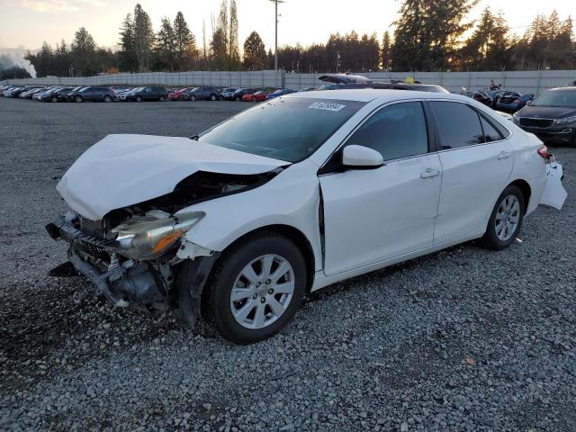 TOYOTA CAMRY LE 2015 with VIN 4T4BF1FK4FR490015 - Photo from auction