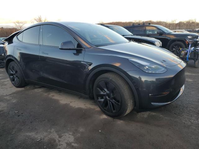 Снимка 4 от търг – 2024 TESLA MODEL Y с VIN 7SAYGAEE4RF207551