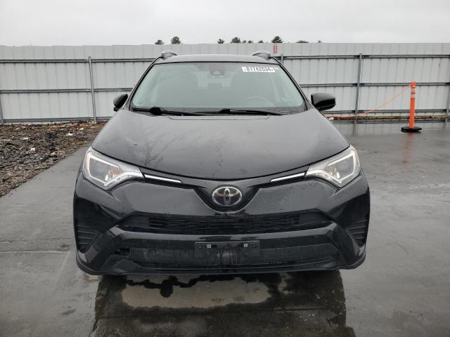 Photo 5 from auction – 2018 TOYOTA RAV4 LE with VIN 2T3ZFREV7JW495759
