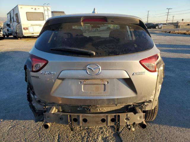 Photo 6 from auction – 2014 MAZDA CX-5 TOURI with VIN JM3KE2CY0E0335720