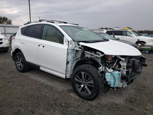 Photo 4 from auction – 2017 TOYOTA RAV4 XLE with VIN JTMWFREV2HD102812