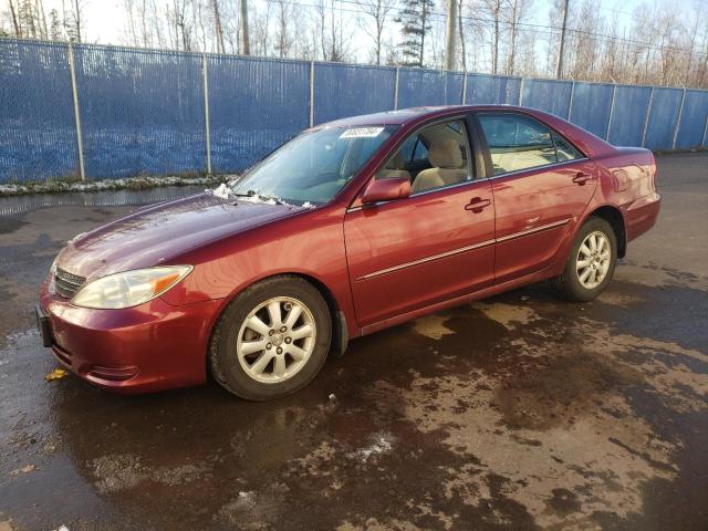 TOYOTA CAMRY LE 2002 with VIN JTDBE30K220107275 - Photo from auction