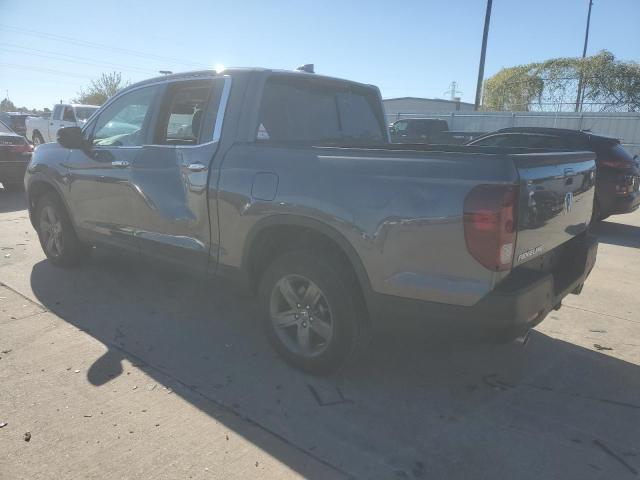 Photo 2 from auction – 2023 HONDA RIDGELINE with VIN 5FPYK3F79PB053088