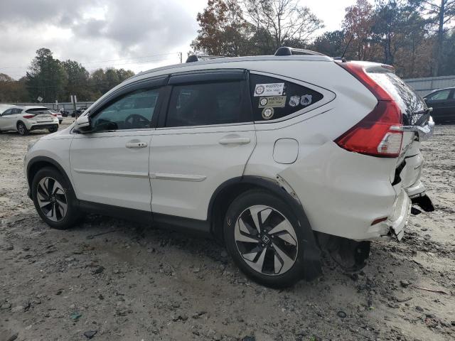 Photo 2 from auction – 2016 HONDA CR-V TOURI with VIN 5J6RM3H96GL019929