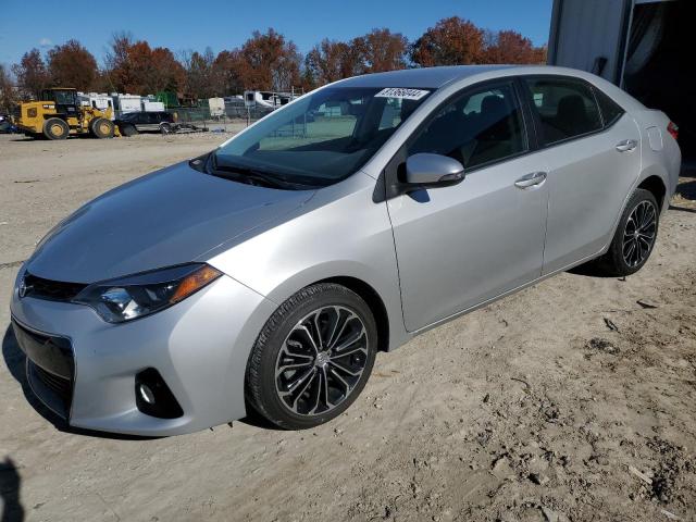TOYOTA COROLLA L 2014 with VIN 5YFBURHE5EP040346 - Photo from auction
