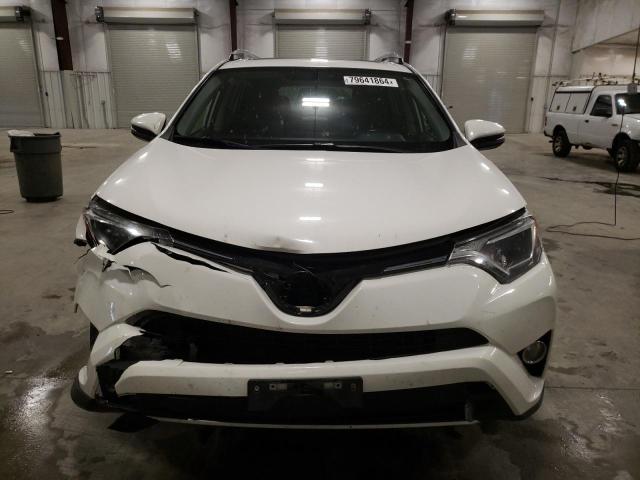 Photo 5 from auction – 2016 TOYOTA RAV4 XLE with VIN JTMRFREV8GJ101189