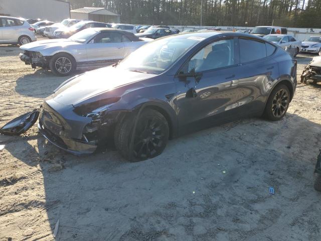 TESLA MODEL Y 2023 with VIN 7SAYGDED8PF957265 - Photo from auction