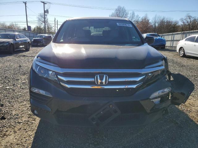 Photo 5 from auction – 2018 HONDA PILOT EX with VIN 5FNYF6H37JB063036
