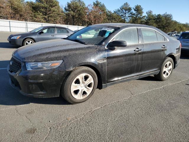 FORD TAURUS POL 2016 with VIN 1FAHP2L85GG154786 - Photo from auction