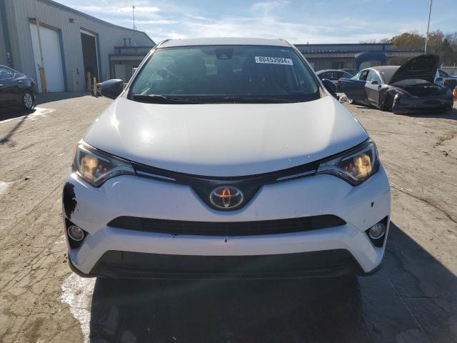 Photo 5 from auction – 2017 TOYOTA RAV4 LE with VIN JTMBFREV6HJ715404
