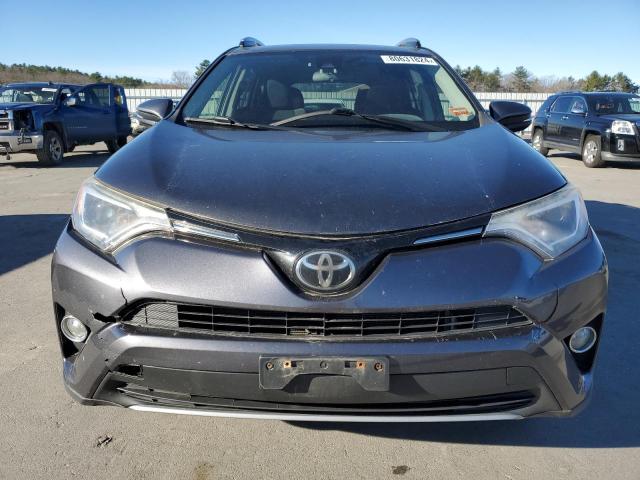 Photo 5 from auction – 2017 TOYOTA RAV4 XLE with VIN JTMRFREV2HJ109404