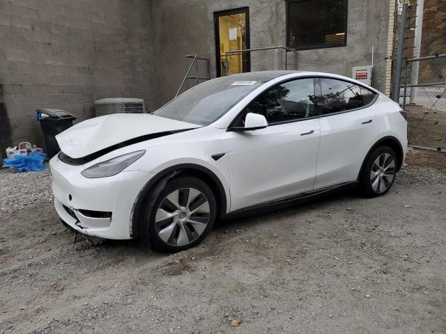 TESLA MODEL Y 2023 with VIN 7SAYGDEE0PF695668 - Photo from auction