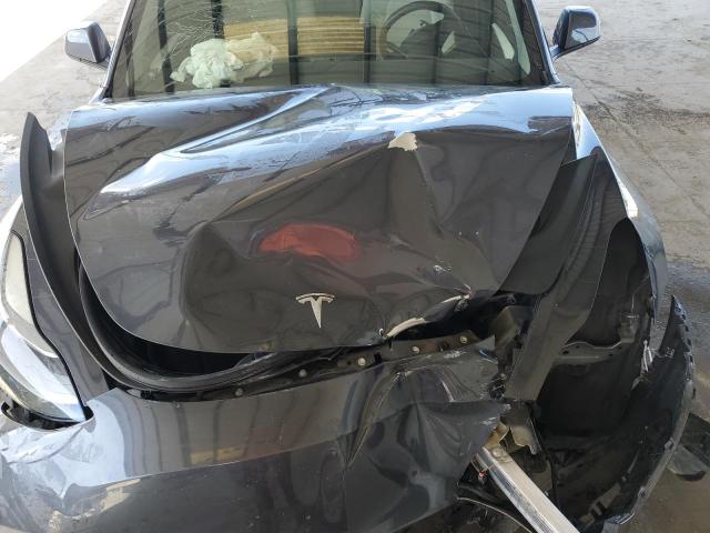 Photo 12 from auction – 2022 TESLA MODEL 3 with VIN 5YJ3E1EA6NF152704