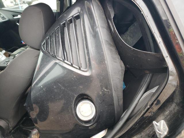 Foto 12 de la subasta – 2014 FORD FOCUS SE con VIN 1FADP3K2XEL328020