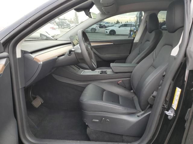 Photo 7 from auction – 2023 TESLA MODEL Y with VIN 7SAYGDED9PF978075