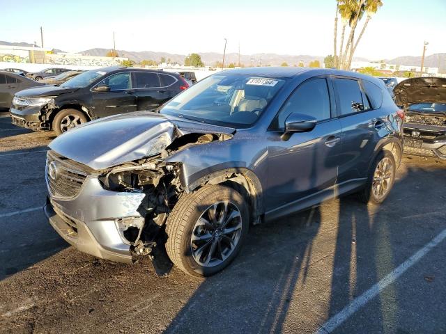 MAZDA CX-5 GT 2016 with VIN JM3KE2DY0G0791539 - Photo from auction