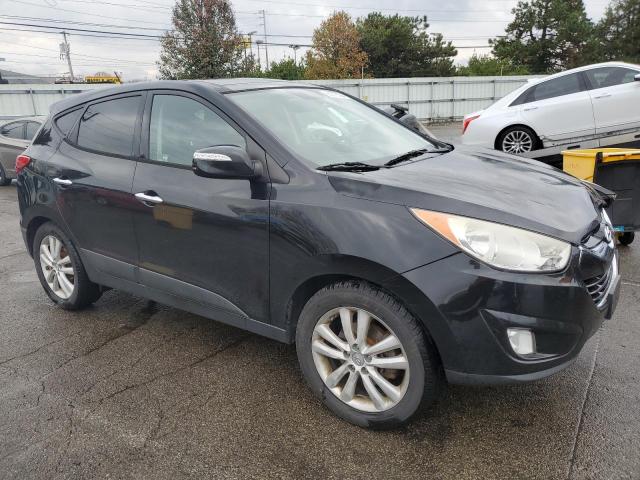 Photo 4 from auction – 2011 HYUNDAI TUCSON GLS with VIN KM8JUCAC9BU311372