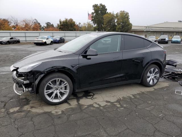 TESLA MODEL Y 2024 with VIN 7SAYGDEE0RF069797 - Photo from auction