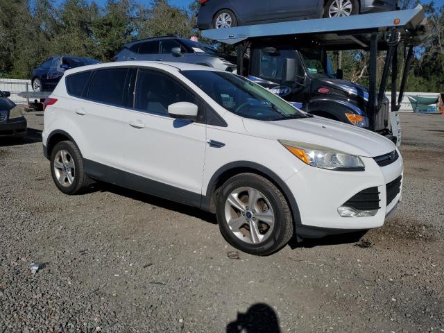 Photo 4 from auction – 2014 FORD ESCAPE SE with VIN 1FMCU0GX8EUC69279