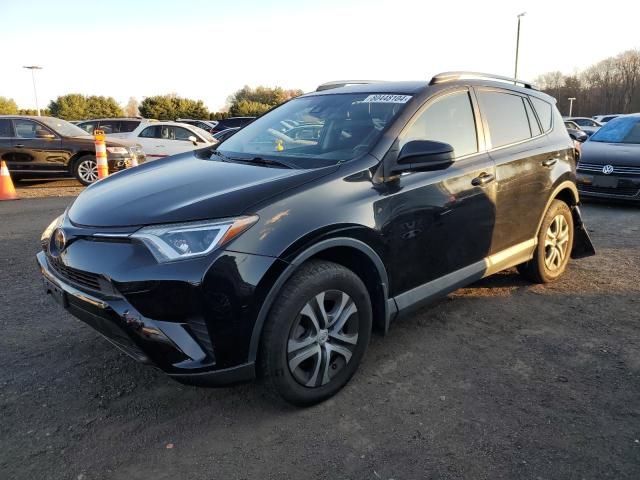 TOYOTA RAV4 LE 2017 with VIN 2T3BFREV8HW692211 - Photo from auction