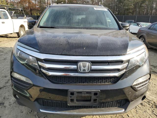 Photo 5 from auction – 2016 HONDA PILOT TOUR with VIN 5FNYF6H92GB052247