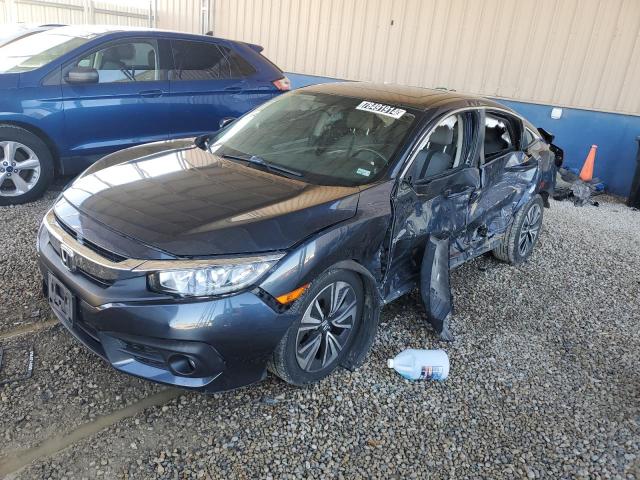 HONDA CIVIC EX 2018 with VIN JHMFC1F33JX001255 - Photo from auction