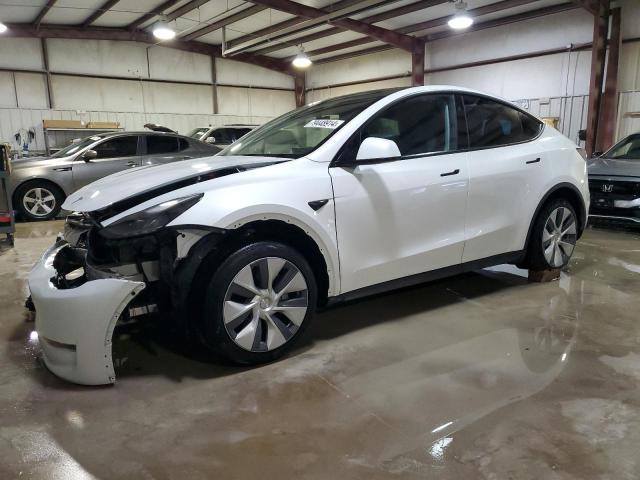 TESLA MODEL Y 2023 with VIN 7SAYGAEE0PF966808 - Photo from auction