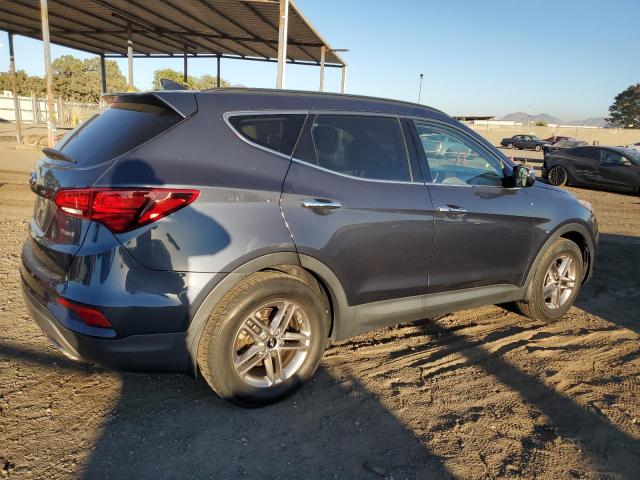 Photo 3 from auction – 2017 HYUNDAI SANTA FE S with VIN 5NMZU3LB3HH012214