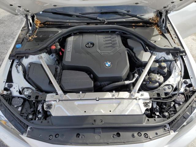 Photo 11 from auction – 2022 BMW 430I with VIN WBA23AT08NCK98169