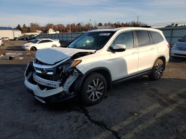 HONDA PILOT EXL 2021 with VIN 5FNYF6H58MB064668 - Photo from auction