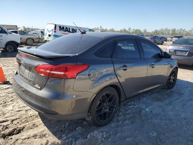 Photo 3 from auction – 2015 FORD FOCUS SE with VIN 1FADP3F24FL323746