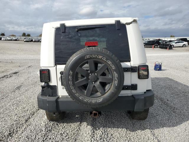 Photo 6 from auction – 2010 JEEP WRANGLER U with VIN 1J4BA5H13AL164191