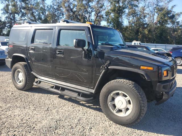 Photo 4 from auction – 2003 HUMMER H2 with VIN 5GRGN23UX3H136571