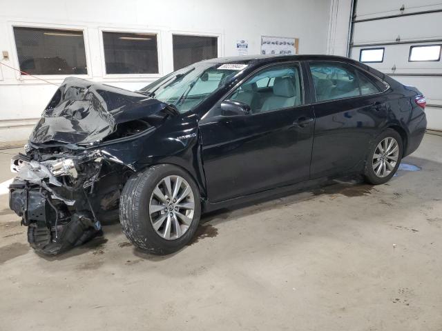 TOYOTA CAMRY HYBR 2016 with VIN 4T1BD1FK2GU186134 - Photo from auction