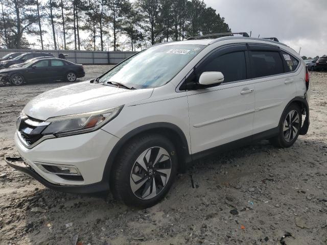 HONDA CR-V TOURI 2016 with VIN 5J6RM3H96GL019929 - Photo from auction