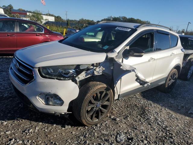 FORD ESCAPE TIT 2017 with VIN 1FMCU0J97HUC30987 - Photo from auction