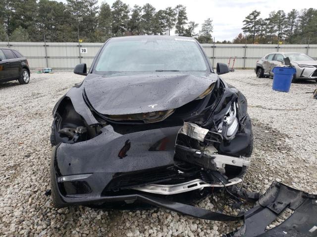 Photo 5 from auction – 2022 TESLA MODEL Y with VIN 7SAYGAEEXNF329874