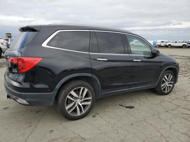 Photo 3 from auction – 2016 HONDA PILOT ELIT with VIN 5FNYF6H02GB121942