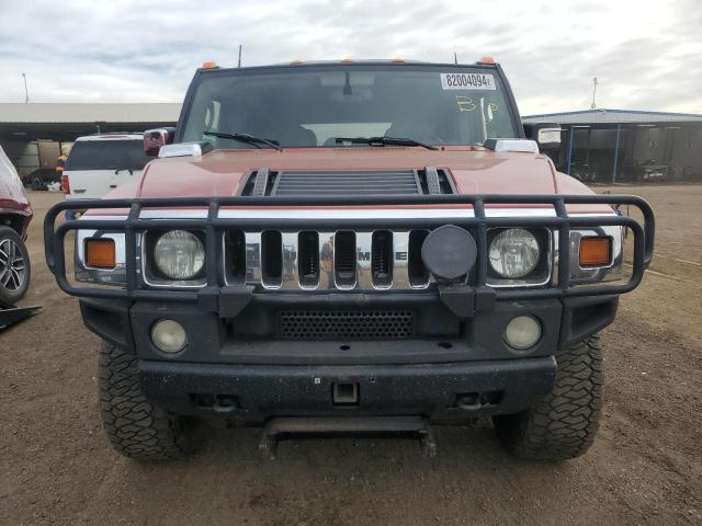Фото 5 с аукциона – 2003 HUMMER H2 с VIN 5GRGN23UX3H122282