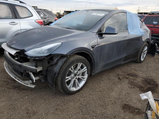 TESLA MODEL Y 2023 with VIN 7SAYGDEE7PF706519 - Photo from auction
