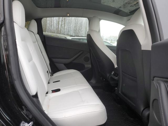 Photo 11 from auction – 2023 TESLA MODEL Y with VIN 7SAYGDEE3PF912209