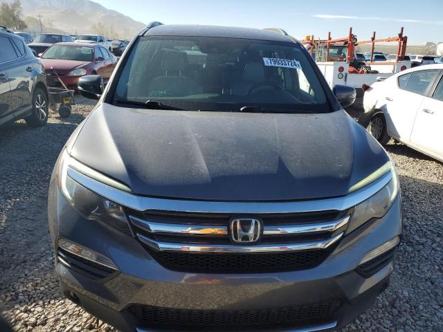 Photo 5 from auction – 2016 HONDA PILOT ELIT with VIN 5FNYF6H07GB014692