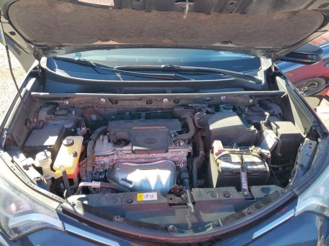 Photo 11 from auction – 2018 TOYOTA RAV4 LE with VIN JTMZFREV7JJ167904