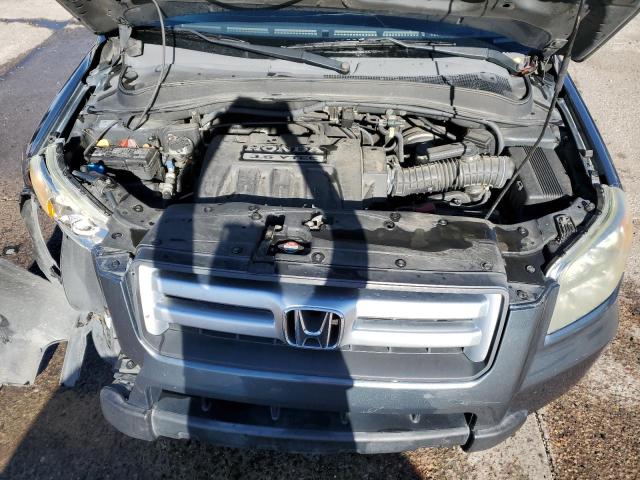 Photo 12 from auction – 2006 HONDA PILOT EX with VIN 2HKYF18786H558957