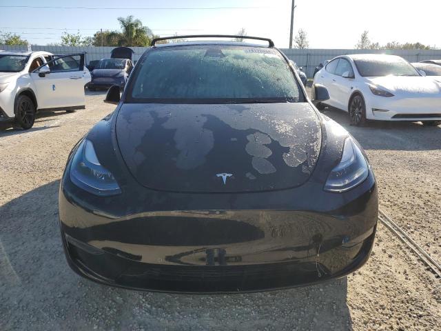 Photo 5 from auction – 2022 TESLA MODEL Y with VIN 7SAYGDEFXNF375487
