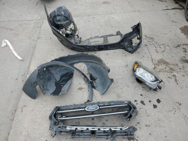 Photo 13 from auction – 2019 FORD ESCAPE SE with VIN 1FMCU9GD1KUB03224